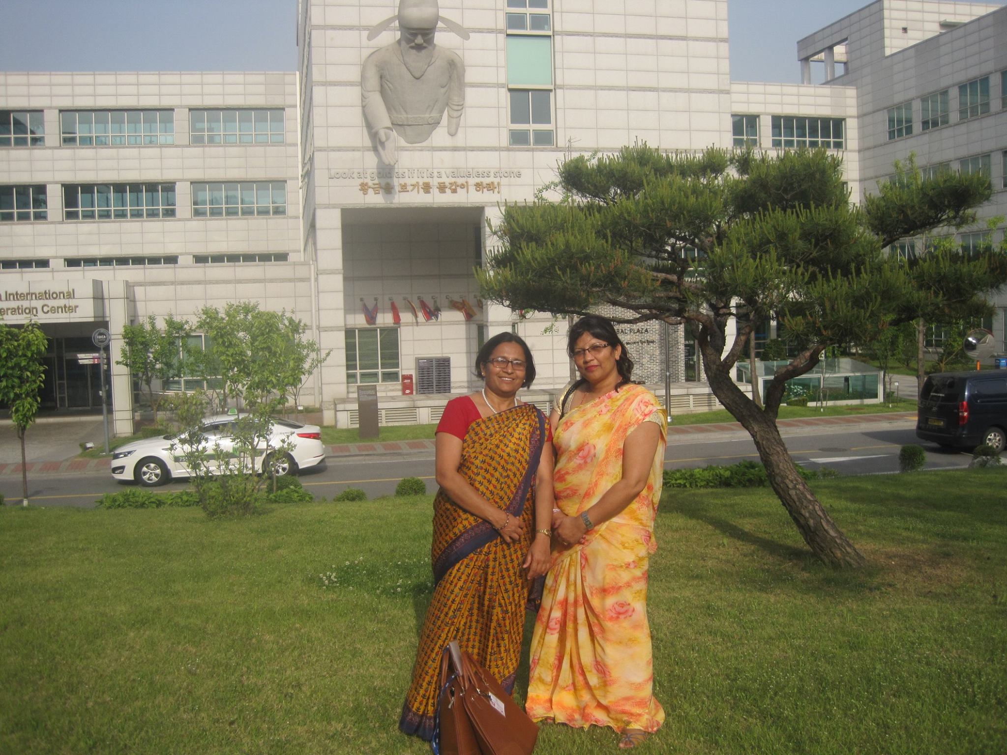 Paru and her colleague in Nepalese sari in South Korea.